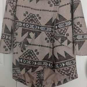 LA Hearts jacket in tan/black cross zipper two pockets on each side.